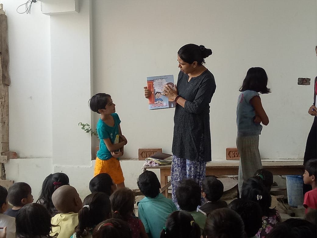 Sarita Teaching Underpriviledged Children