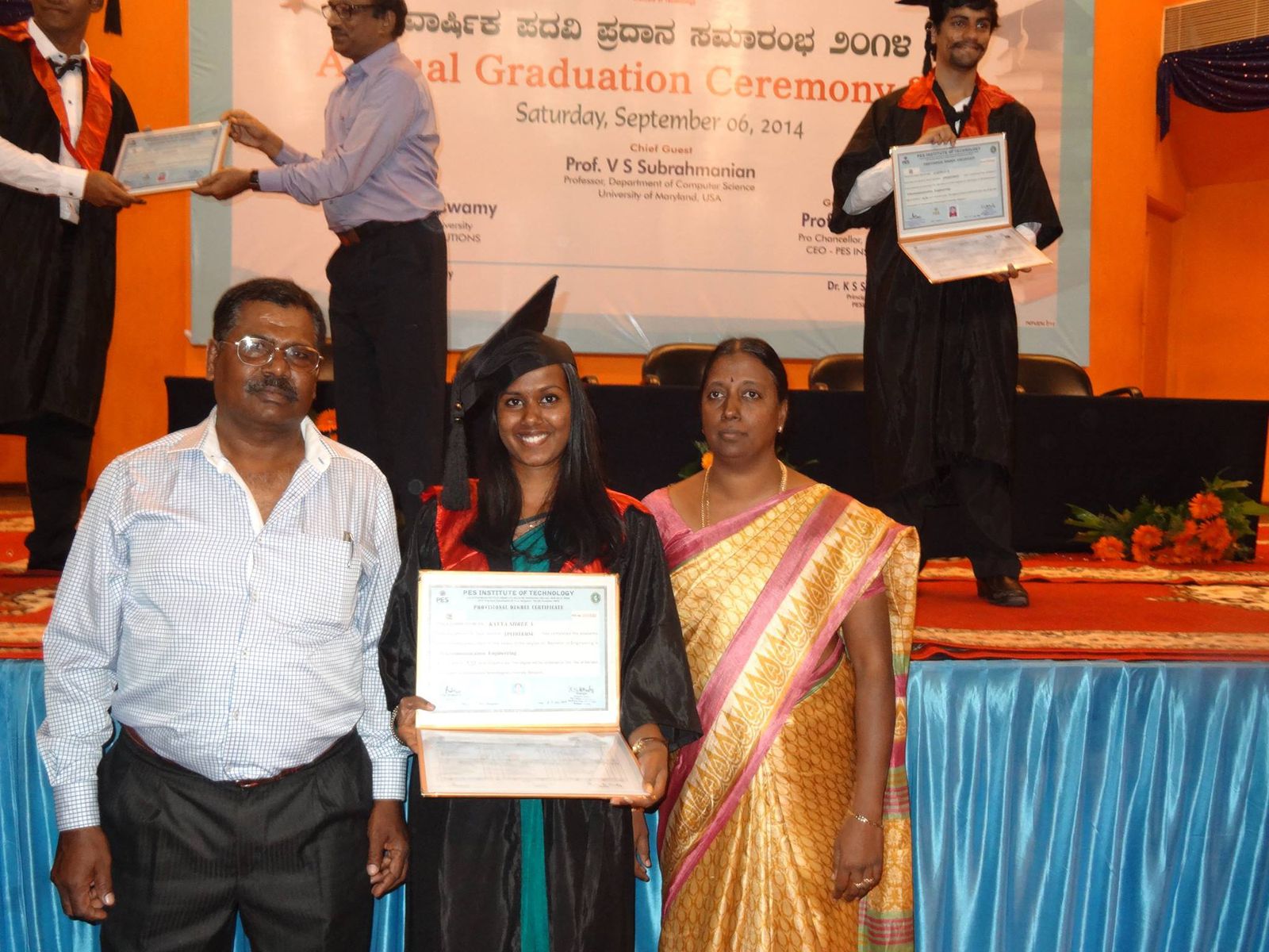 kavya with her parents at convocation