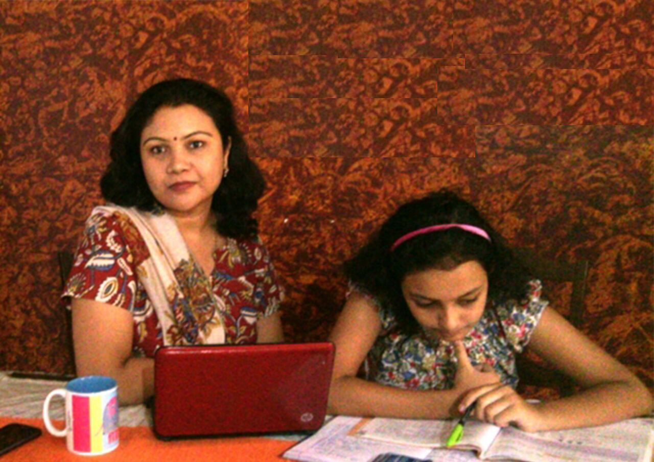 susmita with daughter and laptop