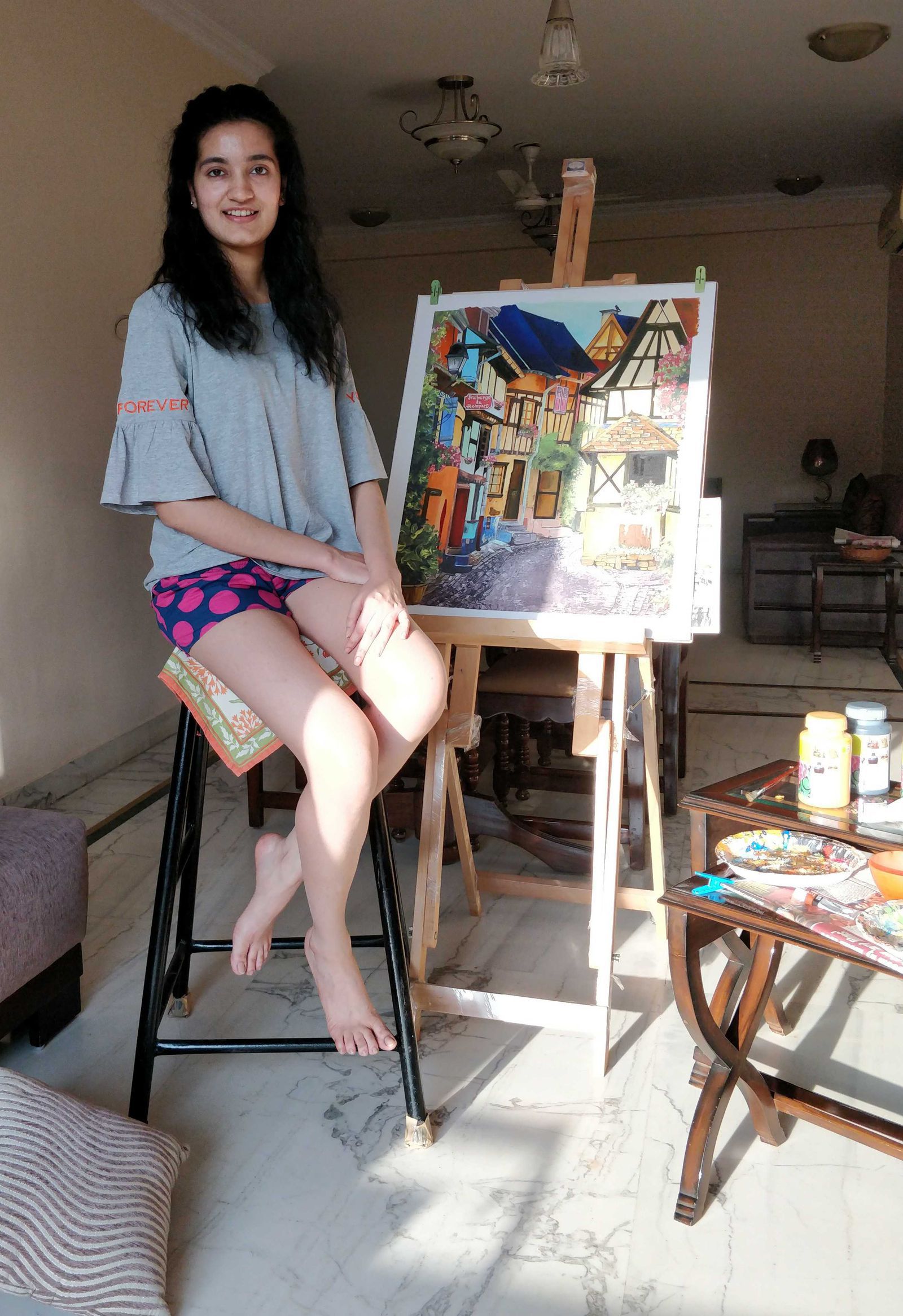 vrinda with one of her artworks