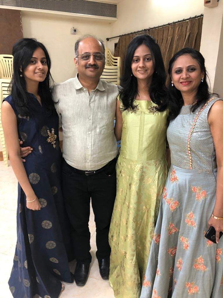 dr bhavi mody with her husband and two daughters